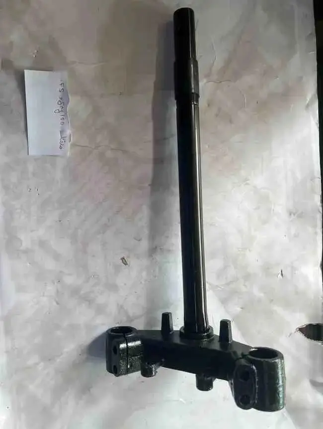 FS/JOG100 ملقط - أجزاء التوجيه - عادي – ملقط لدراجات FS وJOG100، يربط الشوكات بالإطار لضمان ثبات التوجيه والسيطرة الموثو...