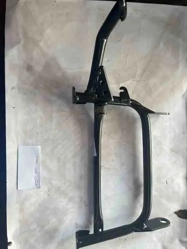 قاعدة الدراجة الوسطية V150 - الهيكل والإطار - عادي – قاعدة الدراجة الوسطية لدراجات V150، تحافظ على الدراجة بوضعية عمودية للركن أو الص...